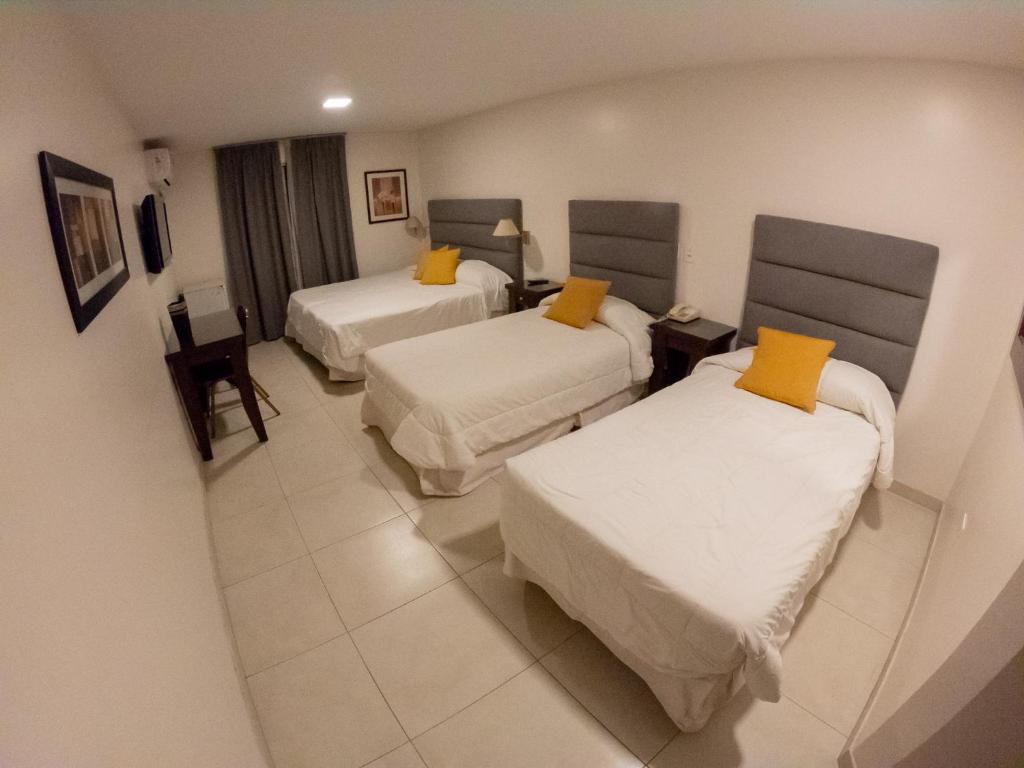 Habitación Cuádruple - Hotel Metropol Tucumán - Imagen 3